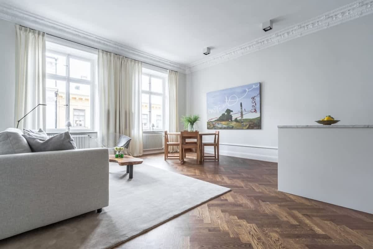 Renovated apartment in Östermalm, Stockholm with balcony and herringbone flooring.