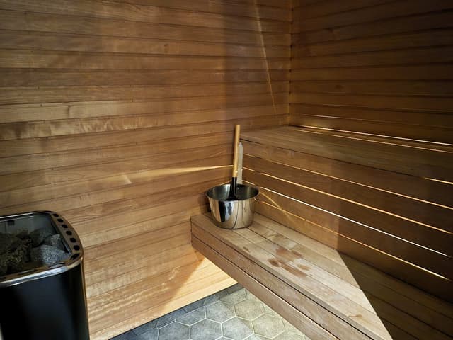 Ski-in/ski-out apartment in central Åre with private sauna and south-facing patio near the slopes