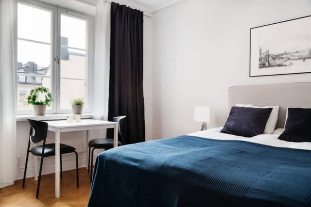 Interior of a snug studio near Mariatorget cafés and unique boutiques.