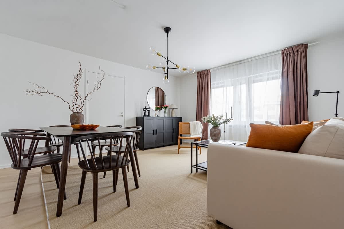 Windowless bedroom, cozy living space, modern kitchenette in budget SoFo apartment, Södermalm
