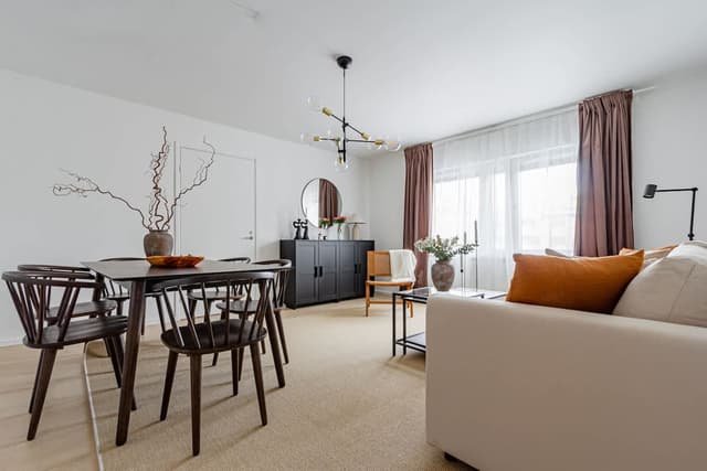 Windowless bedroom, cozy living space, modern kitchenette in budget SoFo apartment, Södermalm