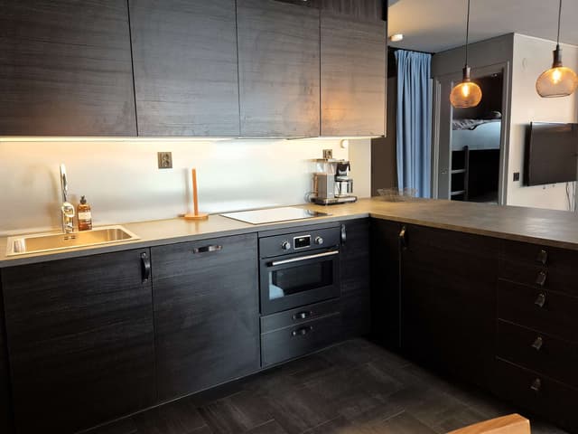 Ski-in/ski-out apartment in central Åre with private sauna and south-facing patio near the slopes