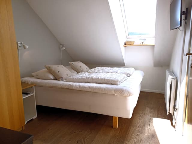 Modern duplex apartment in central Åre with lake view, rooftop terrace and private sauna near ski lifts