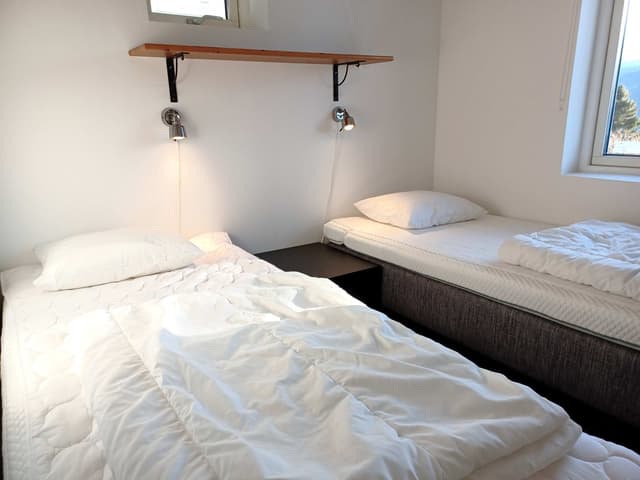 120 sqm apartment in Åre for 16 guests with south-facing balcony, open-plan kitchen and two private saunas