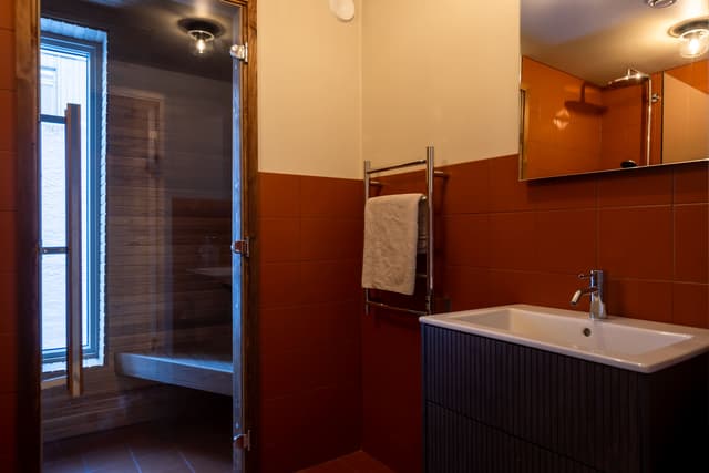 Åre apartment balcony, private sauna, ski storage, cozy lounge, central Åre accommodation