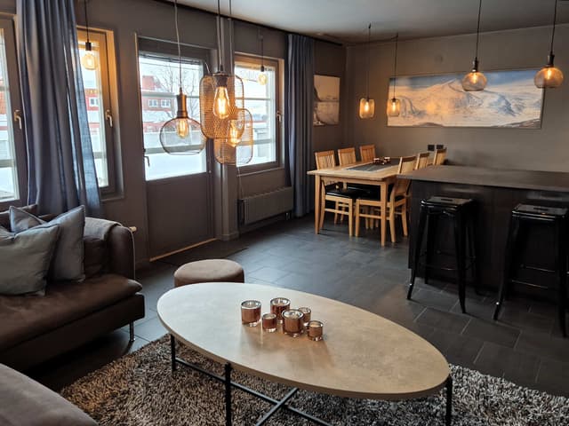Ski-in/ski-out apartment in central Åre with private sauna and south-facing patio near the slopes