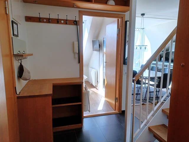 Modern duplex apartment in central Åre with lake view, rooftop terrace and private sauna near ski lifts