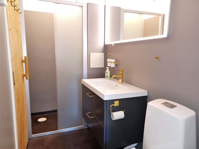 Ski-in/ski-out apartment in central Åre with private sauna near the slope, lifts and village square
