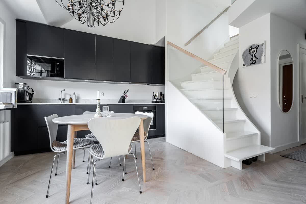Södermalm Stockholm apartment interior with private balcony and city skyline views