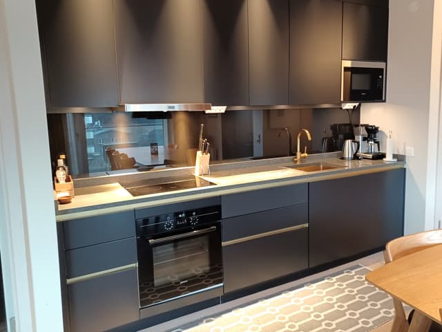 Modern apartment in Åre near the square with fireplace, private sauna, balcony and easy access to ski lifts.
