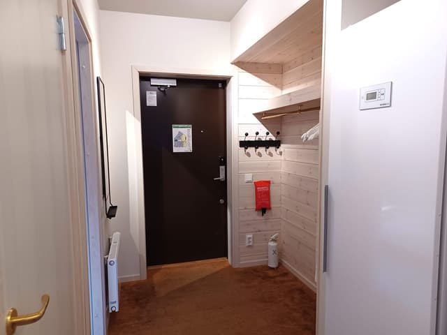 Modern apartment in Åre near the square with fireplace, private sauna, balcony and easy access to ski lifts.
