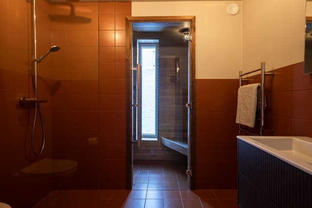 Åre apartment balcony, private sauna, ski storage, cozy lounge, central Åre accommodation
