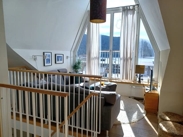 Modern duplex apartment in central Åre with lake view, rooftop terrace and private sauna near ski lifts