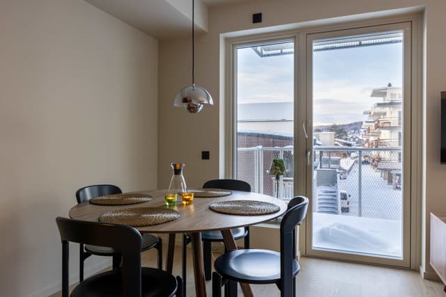 Åre apartment balcony, private sauna, ski storage, cozy lounge, central Åre accommodation