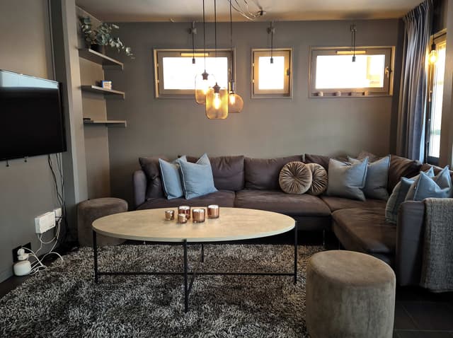 Ski-in/ski-out apartment in central Åre with private sauna and south-facing patio near the slopes