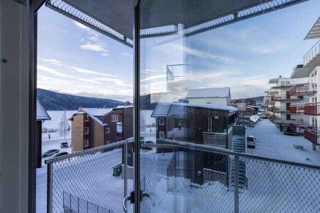Åre apartment balcony, private sauna, ski storage, cozy lounge, central Åre accommodation