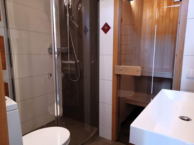 Modern duplex apartment in central Åre with lake view, rooftop terrace and private sauna near ski lifts