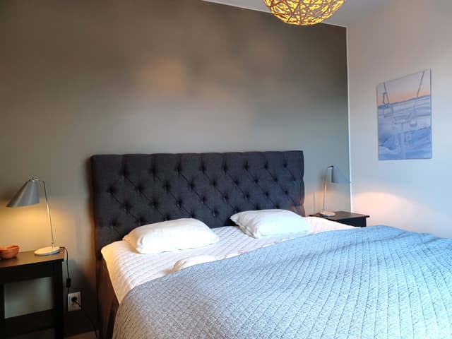 Modern apartment in Åre near the square with fireplace, private sauna, balcony and easy access to ski lifts.